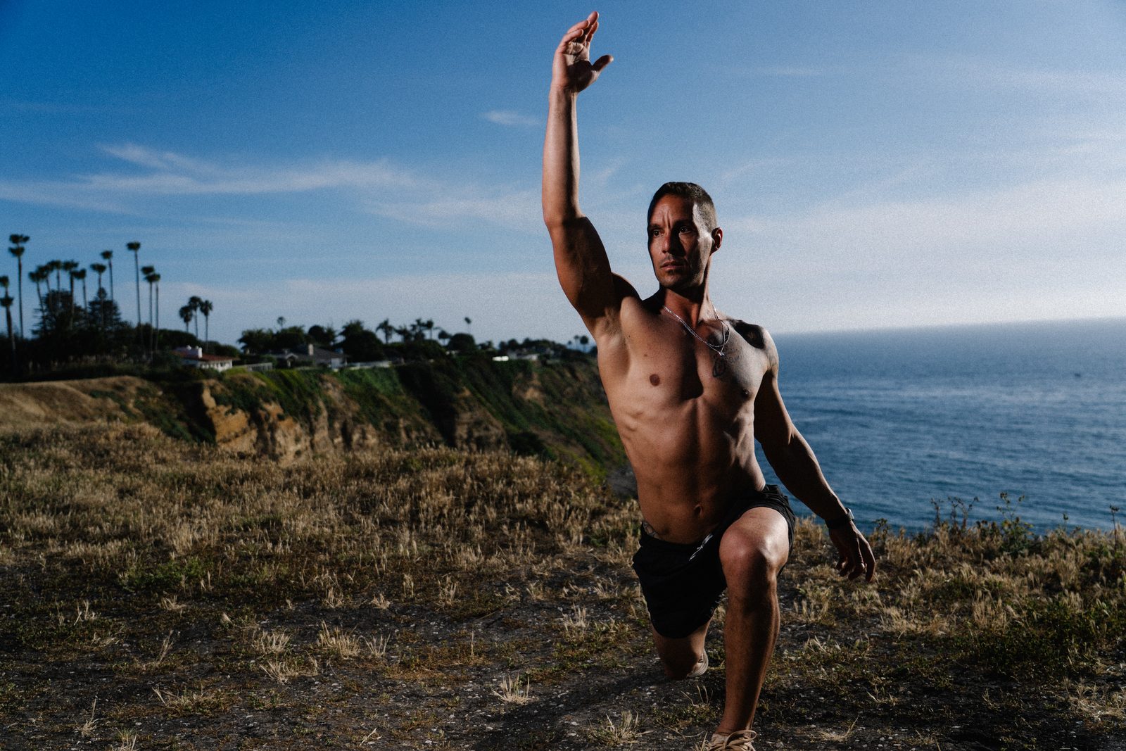 Alex Melo training outdoors above the Pacific