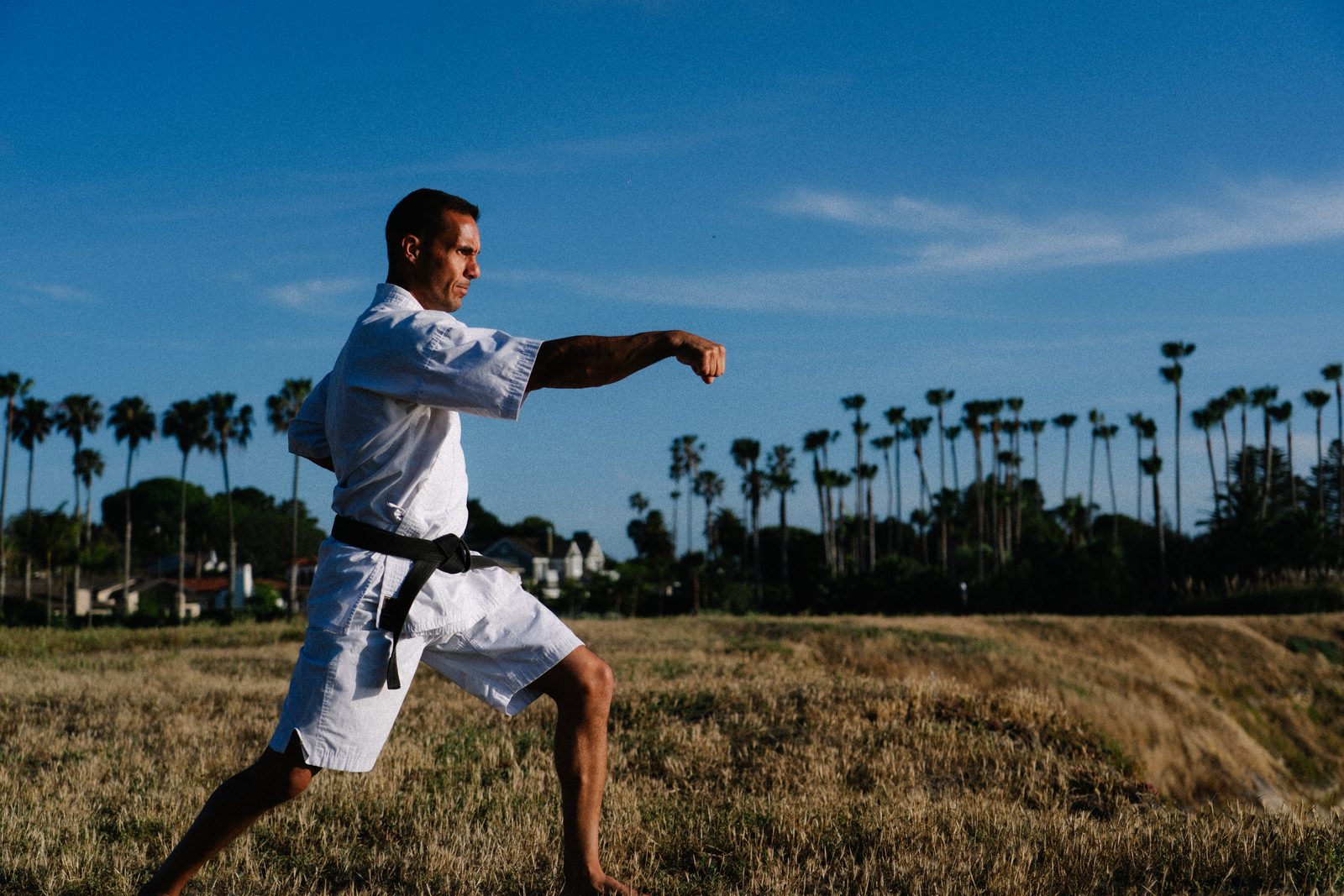 Alex Melo, karate black belt, throwing a kick