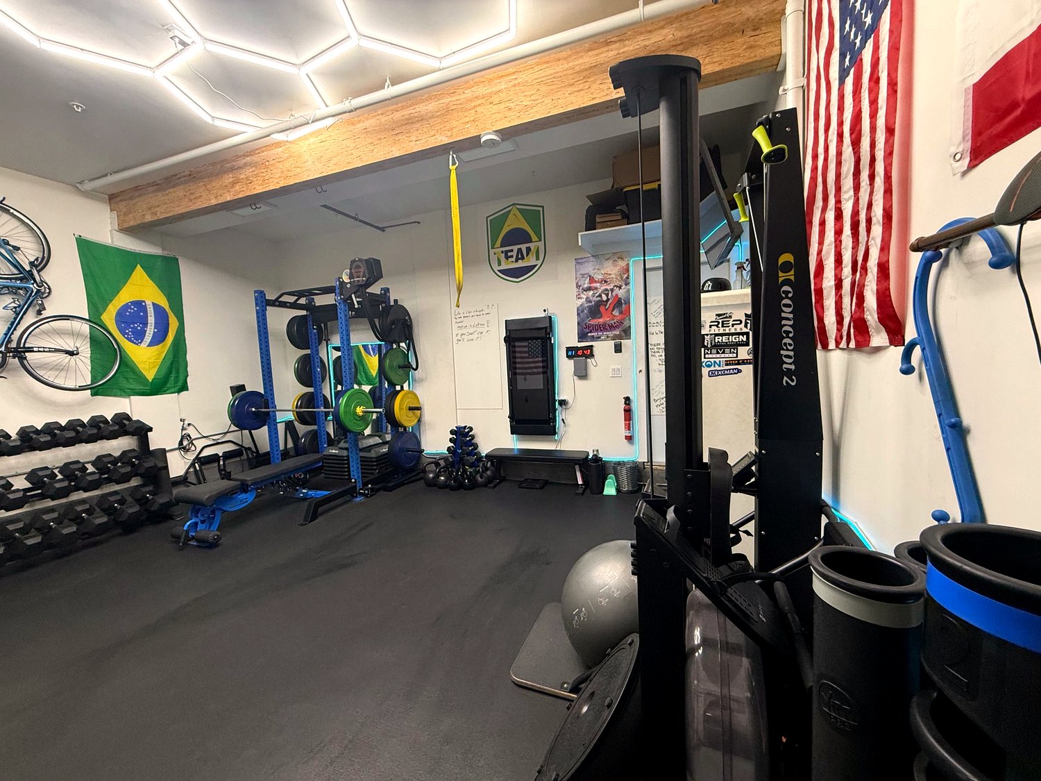 Brazilian flag and ATeam shield on the wall above the rack